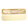 A bamboo fibre cutlery set in a cream-coloured case, including a spoon, fork, and knife. It features a logo.