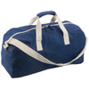 A navy duffle bag with cream handles and a shoulder strap, featuring a zippered closure and a small logo.