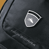 A black backpack featuring a sleek design, with textured fabric and a prominent logo embroidery.