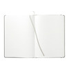 A hardcover notebook with stone paper, featuring blank lined pages and a ribbon marker. The cover is black.