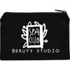 A black cotton travel pouch with a zip closure and a logo featuring a spa theme.