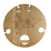 A round bamboo picnic table featuring cutouts for drinks and a logo, in natural wood colour.