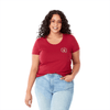 A red women's short sleeve tee with a rounded neckline and a logo on the front, paired with light blue jeans.
