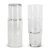 A stackable glass tumbler set in clear glass, featuring four tumblers and a larger glass.