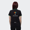 A black women's polo shirt with green accents, featuring a logo on the back and a name on the lower hem.