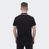 A black polo shirt with contrasting trim, featuring a small logo on the back.