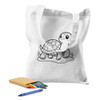 A white calico tote bag featuring a turtle illustration, accompanied by a set of colourful crayons.