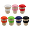 A collection of reusable coffee cups in various colours: white, pink, orange, green, red, blue, and black, each with a silicone band.