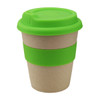 A reusable coffee cup made from bamboo, featuring a natural body and bright green silicone lid and band.