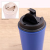 A reusable coffee cup in blue with a black lid, featuring an inset image of a bamboo-style lid.