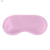 A pink satin sleep eye mask with a smooth surface and curved design. It features a logo on one side.