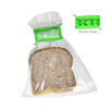 A green food clip is sealing a bag containing slices of brown bread, with a back view displayed beside it.