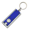 A blue and silver key ring in the shape of a torch, featuring a round button and a metal keychain attachment.