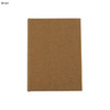 A brown mini sticky note pad with a plain cover and no visible branding or text.