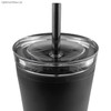 A travel mug with a black exterior, clear lid, and metal straw. Features a logo on the side.