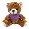 A brown teddy bear plush with a white muzzle, wearing a purple shirt, seated with arms and legs spread out.