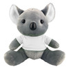 A grey koala plush toy wearing a white t-shirt, with large ears and a round nose. It has a logo on its shirt.