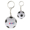 A stress soccer ball key ring in white and black, featuring a logo and attached to a silver keychain.