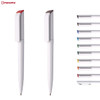 A collection of plastic pens in various colours, featuring a white body and a clip with contrasting caps.