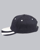 A black structured cap with a contrasting white peak and decorative stripes on the brim, featuring a logo.