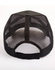 A black trucker cap with a mesh back and an adjustable strap, showcasing a simple design.