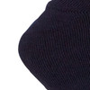 A close-up of a navy blue work sock made from bamboo, featuring a textured knit and a logo.