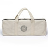 A beige canvas bag with two handles and a logo, designed for storing a quoits set.