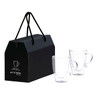 A set of two clear glass coffee cups packaged in a black gift box with a handle.