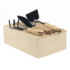 A wooden garden box containing three gardening tools with wooden handles and metal heads.
