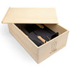 A wooden garden box with various gardening tools inside and a fitted black foam insert for protection.