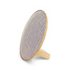 A round Bluetooth speaker in grey fabric with a wooden base, featuring a minimalist design and a logo on the side.