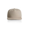 A beige cap with a curved brim and a top button, featuring a logo on the front.