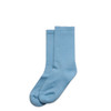 Two pairs of light blue socks arranged neatly, made from soft fabric, with a simple design.