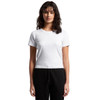 A white ribbed baby tee with short sleeves, modelled by a female figure, paired with black trousers.