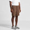 Cord shorts in brown with an elastic waistband and drawstring, worn with grey sneakers against a light background.