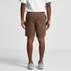 Brown cord shorts featuring a logo and back pockets, viewed from the back on a model.