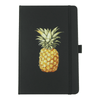 A black leather-bound journal featuring an illustration of a pineapple on the cover. It includes an elastic band closure.