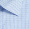 A close-up of a light blue button-up shirt fabric featuring a check pattern with a crisp collar.