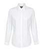A white button-up shirt with long sleeves and a collar, featuring a logo on the label.