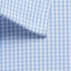 A close-up of a blue and white gingham fabric, showcasing a button-up shirt collar. The fabric features small check patterns.