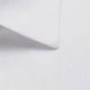 A close-up of a white button-up shirt collar featuring a textured fabric. The shirt has a clean, tailored appearance.
