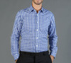 A button-up shirt featuring a blue and white gingham pattern, with a fitted design and long sleeves.
