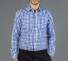 A button-up shirt with a blue and white checked pattern, featuring long sleeves and a collar.