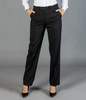 Black slacks with a straight fit and pockets, styled with a white shirt and black heels. Features a logo.