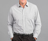 A button-up shirt in black and white checkered pattern with long sleeves, featuring a pocket and a logo.