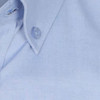 A light blue button-up shirt featuring a collar and a single button. It has a logo on the label.