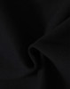 A close-up of black fabric, showcasing a soft, fleecy texture. The material is ideal for apparel like hoodies.