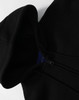 A black men's full-zip fleecy hoodie featuring a hood and a zipper, with a logo visible on the inside.