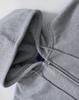 A grey men's full-zip fleecy hoodie with a hood and zippered front. It features a branding logo.