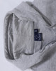 A grey kid's full-zip fleecy hoodie with a hood and a label inside.